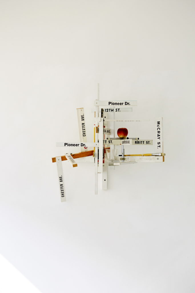 Greg Colson, Six Intersections (Schools), 2003. Oil, acrylic, and graphite on wood and metal with objects, 81.3 x 81.3 x 53.3 cm, 32 x 32 x 21 inch.