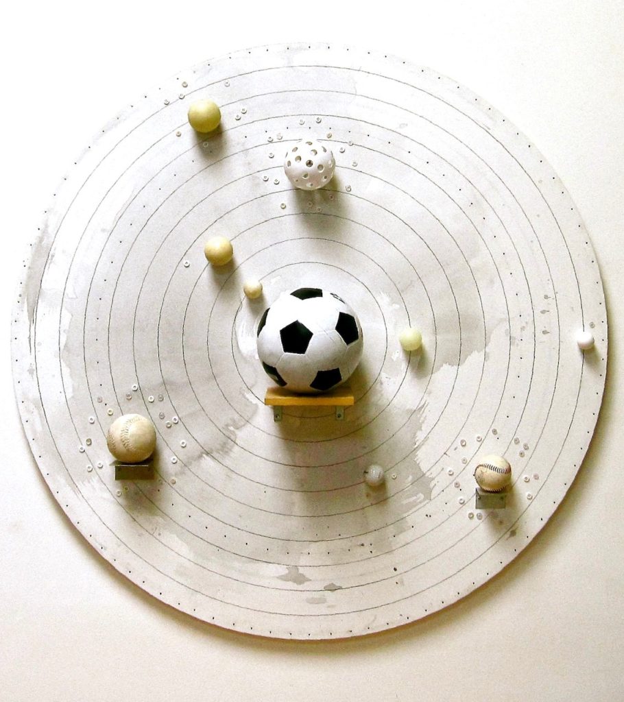 Greg Colson, White Solar System (Baden Sun), 1995-2010. Acrylic and graphite on wood disc with balls, buttons, and shelves, 120 x 23 cm, 47 1/4 x 9 inch.