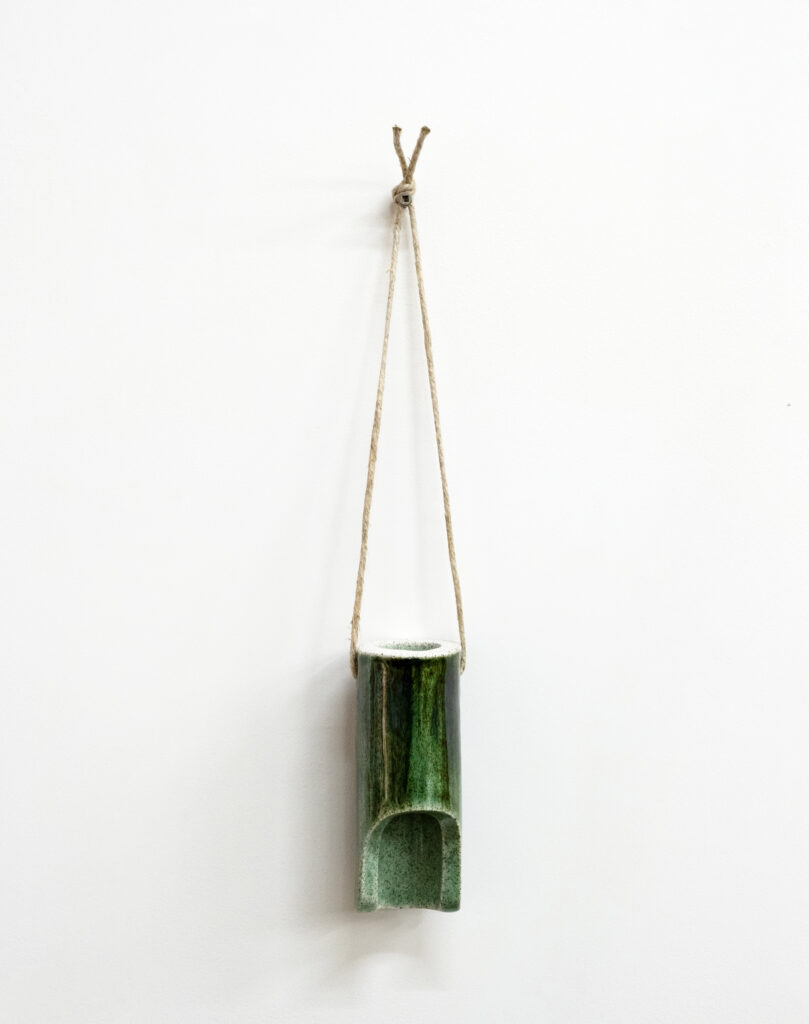 Untitled 2023 stoneware, glaze, twine 15 ½ x 2 ¼ x 2 ¼ in